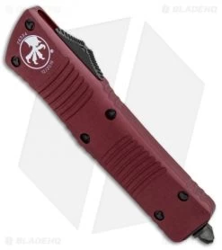 Microtech Combat Troodon D/E OTF Automatic Knife Merlot Red (3.8" Black) 7 Microtech Combat Troodon D/E OTF Automatic Knife Merlot Red (3.8" Black) -Microtech Shop Microtech Combat Troodon DE OTF Auto Merlot Red Black 142 1MR BHQ 104922 jr spine