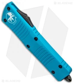 Microtech Combat Troodon D/E OTF Automatic Knife Turquoise (3.8" Black) -Microtech Shop Microtech Combat Troodon DE OTF Auto Turquoise Black 142 1TQ BHQ 97177 jr spine