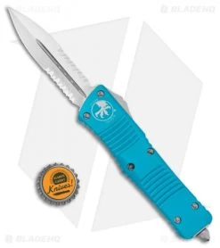 Microtech Combat Troodon OTF Knife D/E Dagger Turquoise (3.8" Satin Serr) -Microtech Shop Microtech Combat Troodon OTF DE Dagger Turquoise Satin Serr 142 5TQ BHQ 98094 jr bottlecap 1