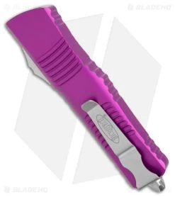 Microtech Combat Troodon OTF Knife D/E Dagger Violet (3.8" Stonewash Serr) -Microtech Shop Microtech Combat Troodon OTF DE Dagger Violet SW Serr BHQ 98061 jr side