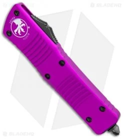 Microtech Combat Troodon OTF D/E Dagger Knife Violet (3.8" Black Plain) -Microtech Shop Microtech Combat Troodon OTF Dagger Violet Black 142 1VI BHQ 98073 jr spine