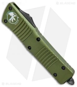 Microtech Combat T/E Automatic OTF Knife OD Green (3.8" Black Full Serr) -Microtech Shop Microtech Combat Troodon TE Auto OD Green Black Full Serr 144 3OD BHQ 98232 jr spine