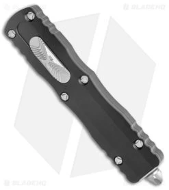 Microtech Dirac Dagger OTF Automatic Knife Black (2.88" Stonewash Full Serr) -Microtech Shop Microtech Dirac Dagger OTF Auto Black SW Full Serr BHQ 102135 jr spine