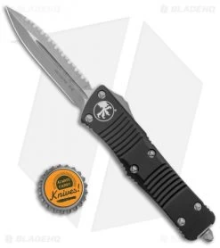 Microtech Troodon Dager D/E OTF Auto Knife (3" Apocalyptic Full Serr) 138-12AP 9 Microtech Troodon Dager D/E OTF Auto Knife (3" Apocalyptic Full Serr) 138-12AP -Microtech Shop Microtech Troodon DE Apocalyptic Black Full Serr BHQ 135898 jr bottlecap