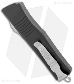 Microtech Troodon D/E OTF Automatic Knife Black (3" Stonewash Double Full Serr) -Microtech Shop Microtech Troodon DE OTF Auto Black SW Double Full Serr 138 D12 BHQ 106924 jr side