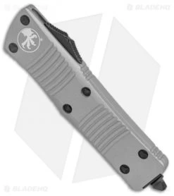 Microtech Troodon D/E OTF Automatic Knife Gray Titanium (3" Black Full Serr) 7 Microtech Troodon D/E OTF Automatic Knife Gray Titanium (3" Black Full Serr) -Microtech Shop Microtech Troodon DE OTF Auto Gray Black Full Serr BHQ 134791 jr spine