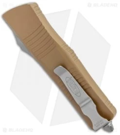 Microtech Troodon D/E OTF Automatic Knife Tan (3" Stonewash Full Serr) -Microtech Shop Microtech Troodon DE OTF Auto Tan SW Full Serr 138 12TA BHQ 97855 jr side