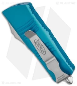 Microtech Troodon Mini D/E CA Legal OTF Auto Knife Turquoise (1.9" Stonewash) -Microtech Shop Microtech Troodon Mini Troodon DE AK Turquoise 1in SW BHQ 174568 td side