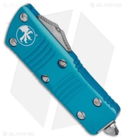 Microtech Troodon Mini D/E CA Legal OTF Auto Knife Turquoise (1.9" Stonewash) -Microtech Shop Microtech Troodon Mini Troodon DE AK Turquoise 1in SW BHQ 174568 td spine