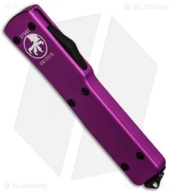 Microtech UTX-70 D/E OTF Automatic Knife Violet (2.4" Black Full Ser) 147-3VI -Microtech Shop Microtech UTX 70 Violet Black Full Serr 147 3VI BHQ 49779 jr spine