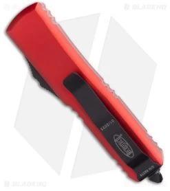 Microtech UTX-85 D/E OTF Automatic Knife Red (3.125" Black Full Serr) 232-3 RD -Microtech Shop Microtech UTX 85 D E OTF Automatic Knife Red Black Full Serr 232 3 RD BHQ 181092 kc side
