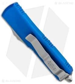 Microtech UTX-85 D/E OTF Automatic Knife Blue (3.125" Satin) 232-4BL 8 Microtech UTX-85 D/E OTF Automatic Knife Blue (3.125" Satin) 232-4BL -Microtech Shop Microtech UTX 85 DE OTF Auto Blue Satin 232 4BL BHQ 93004 jr side